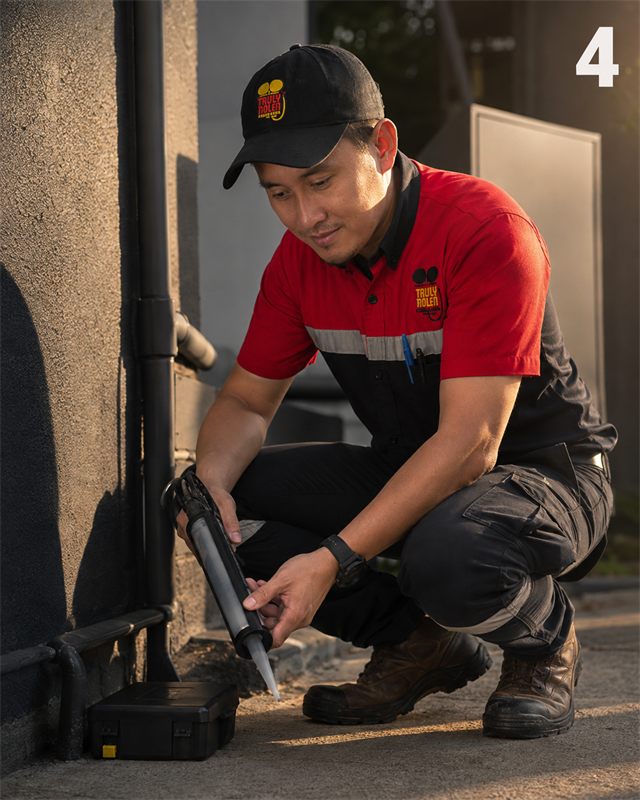 Técnico aplicando prevención y control de plagas